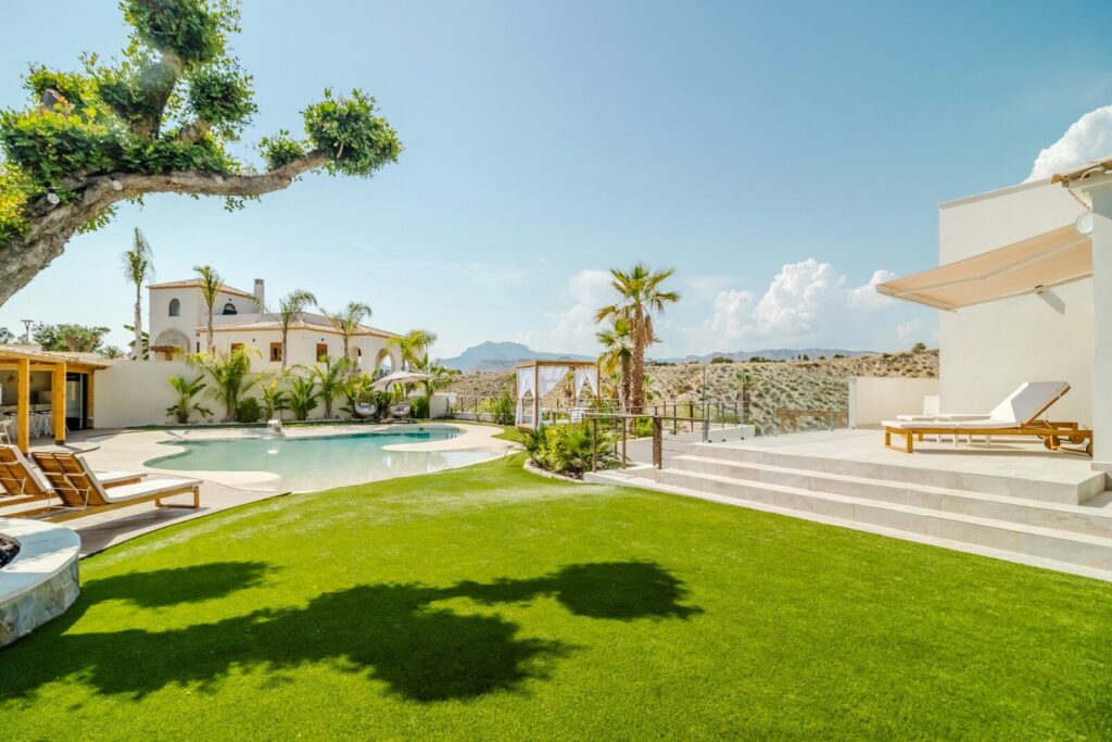 Luxury villa with pool and manicured lawn